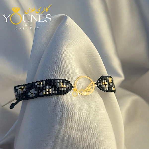 تصویر دوم دستبند میوکی برگ لیزری طلا